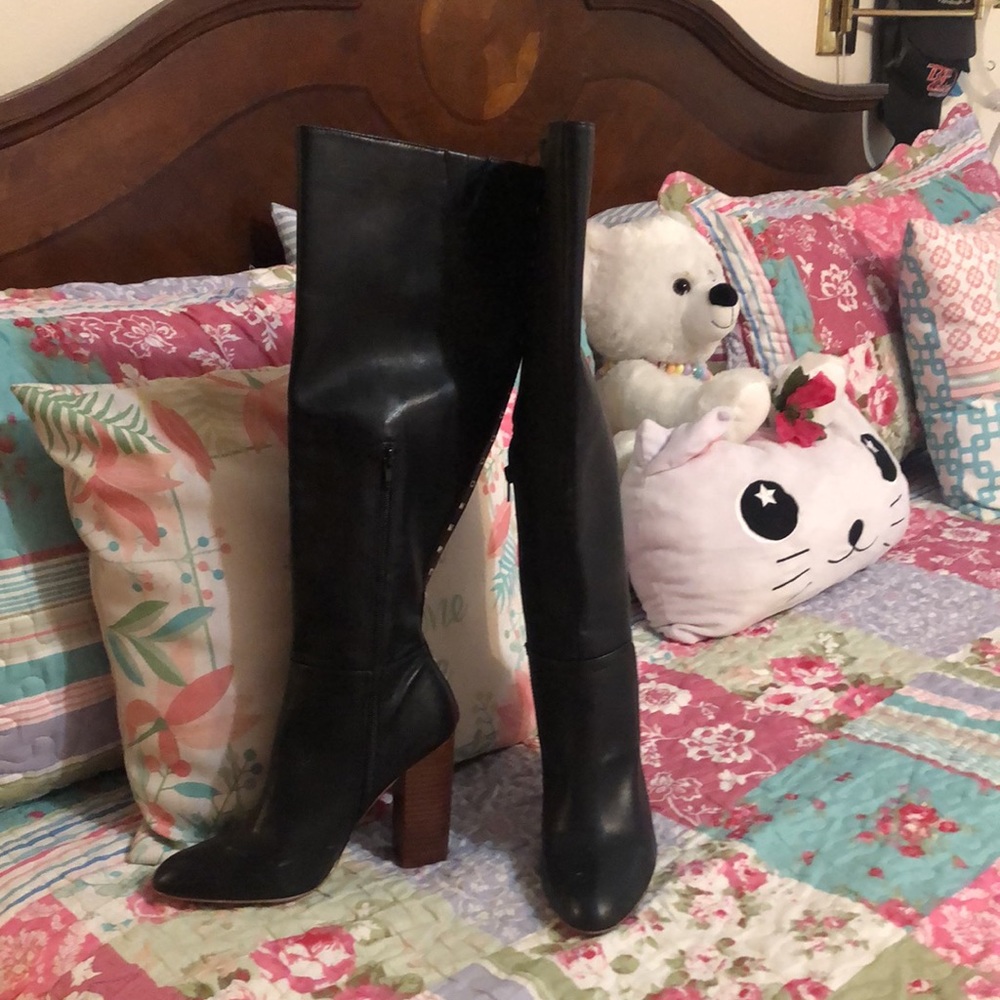 Black tall boots ,studs up the back